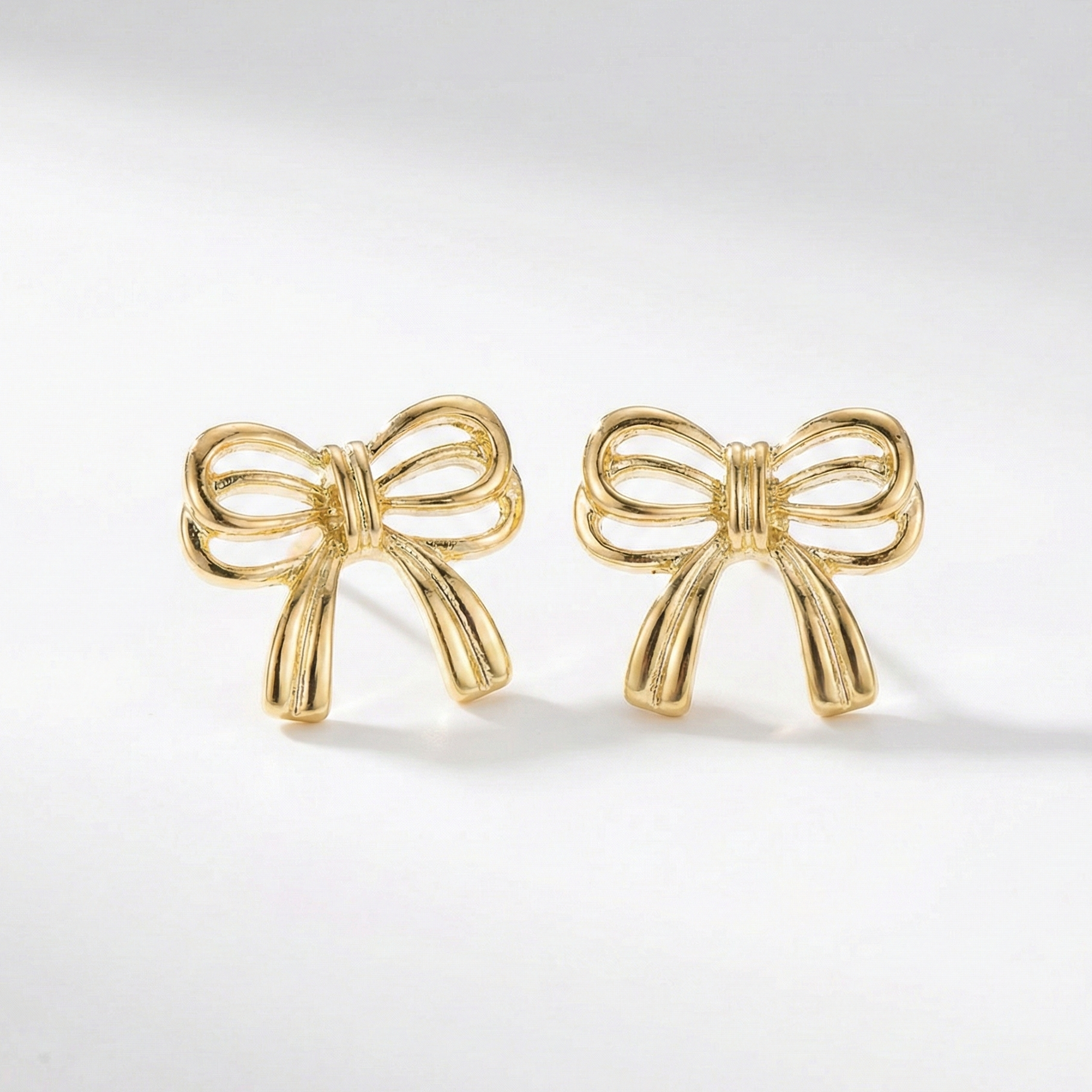 Bae and bow earrings