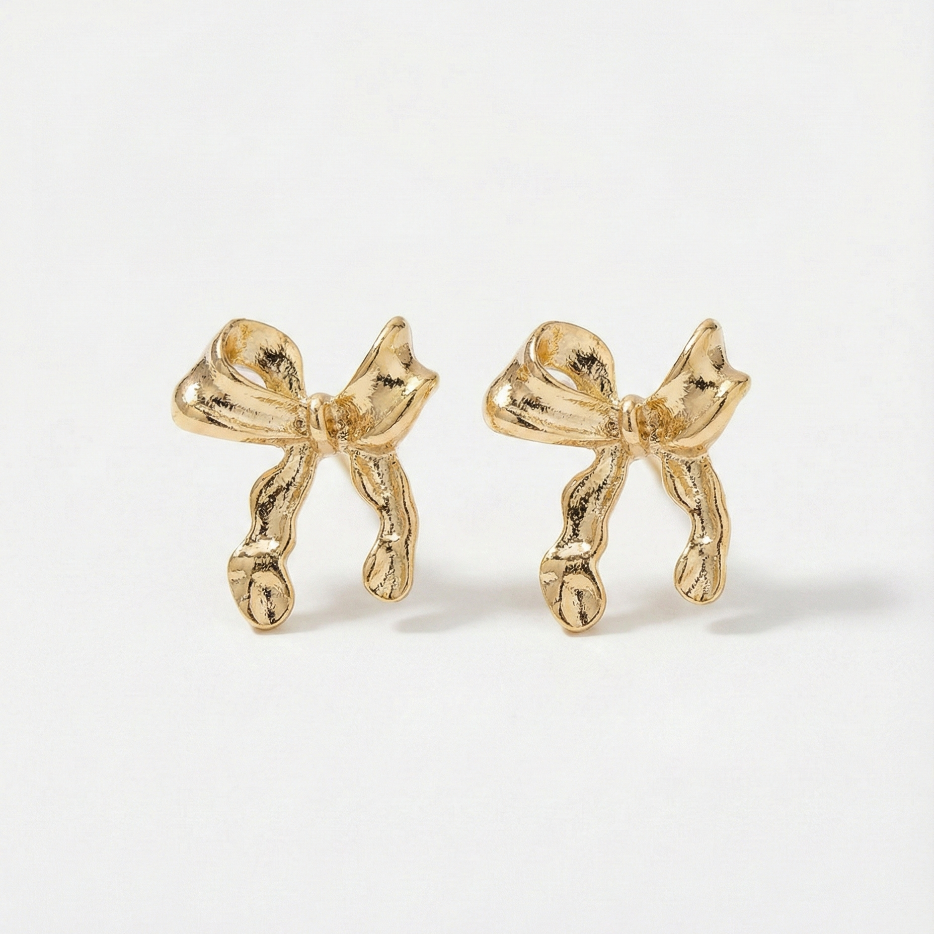 Bae and bow earrings