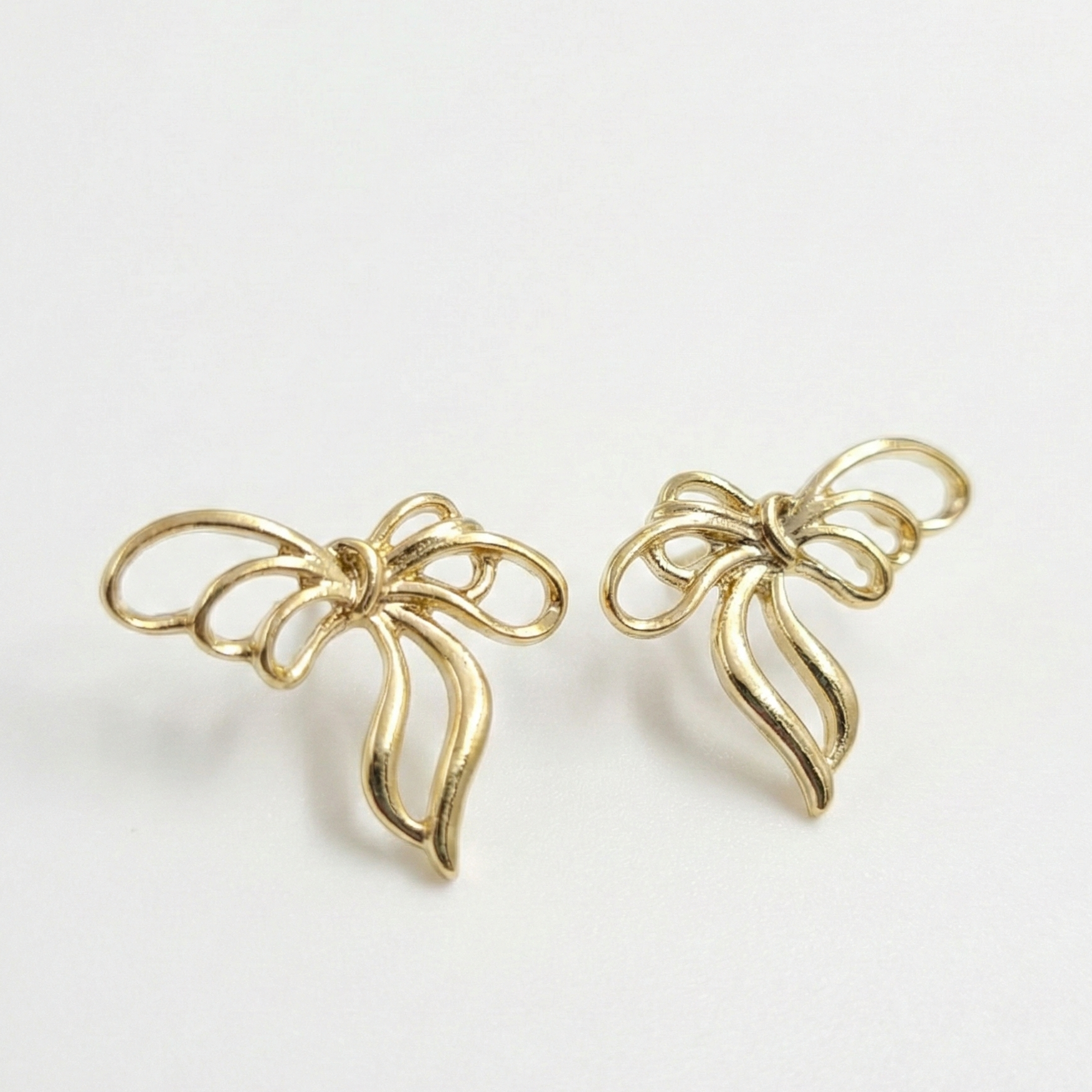 Bae and bow earrings